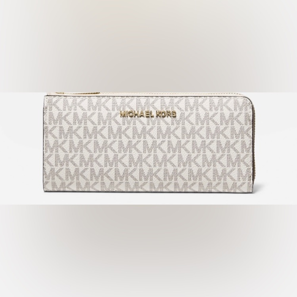 Michael Kors jetset large wallet, new with tags, vanilla with logo